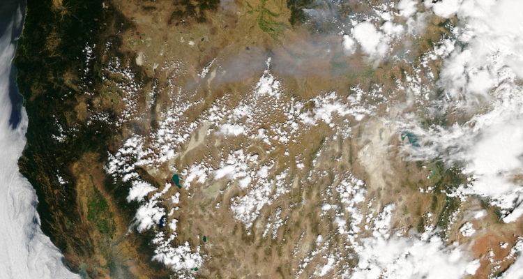 Smoke plumes hang over California, Oregon, Idaho, and Washington