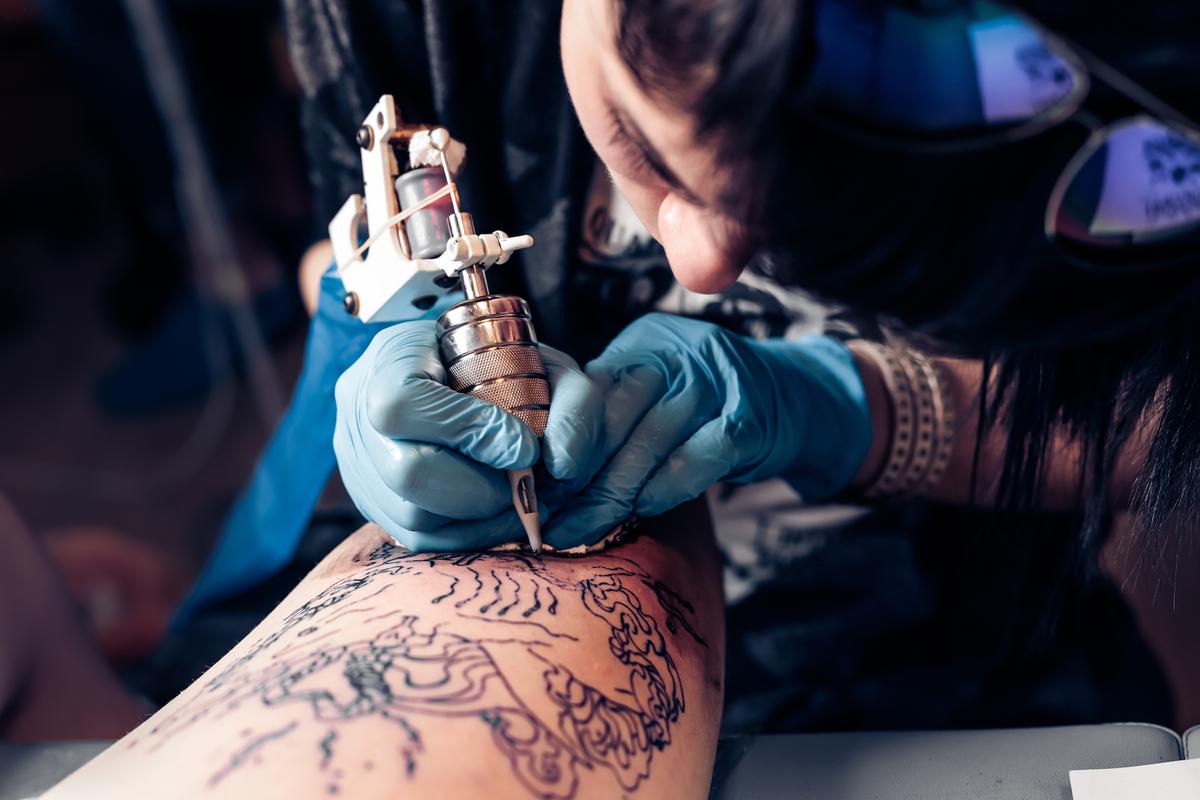How exactly do tattoos stay on your body?