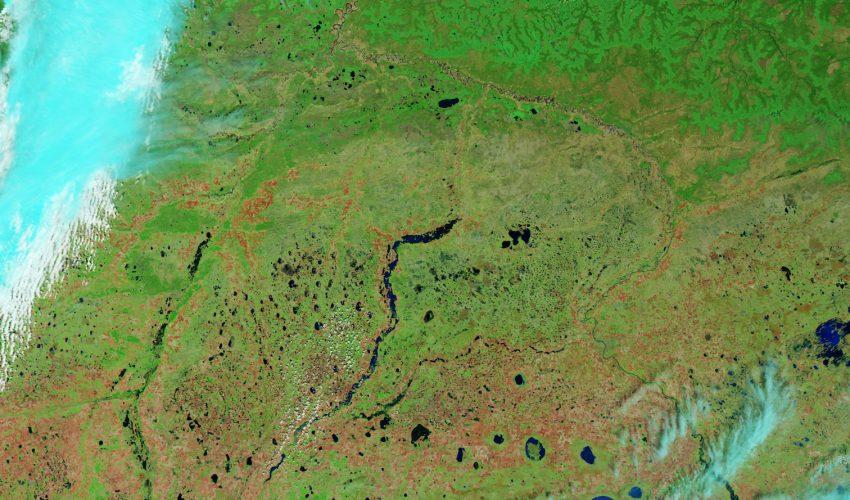 The Ishim River flooding a small Russian town