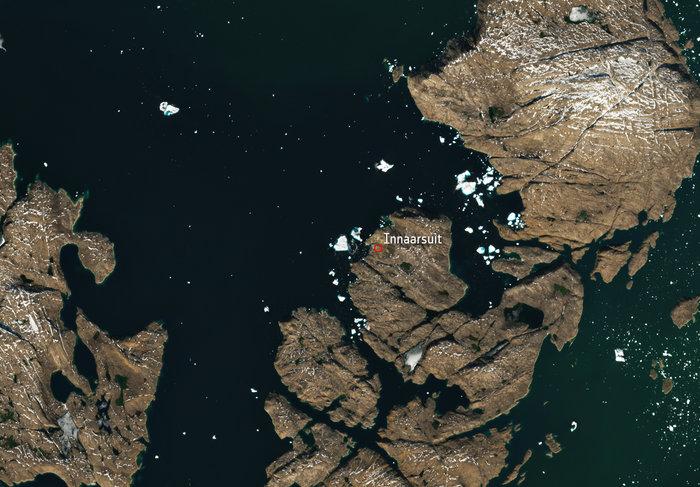 Huge iceberg threatens coastal village in Greenland
