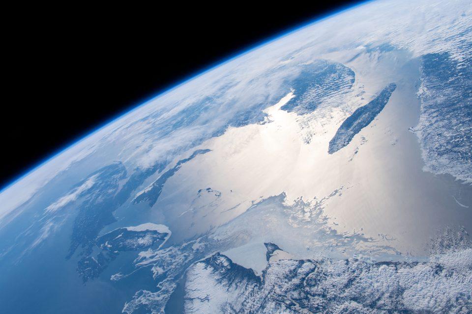 Earth illuminated by sunglint