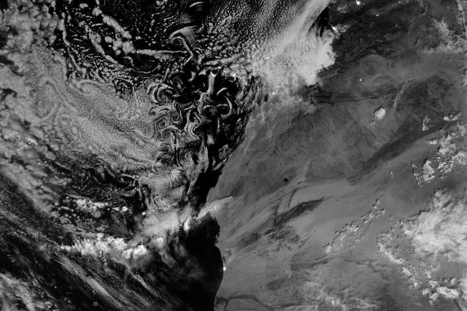 Swirling clouds in the night sky
