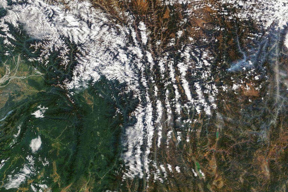 Clouds trace mountain ridges in the Chinese province of Yunnan