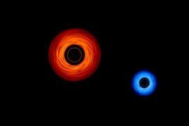 Two black holes dancing around each other