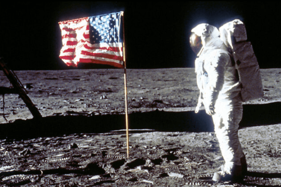 Buzz Aldrin Poses next to the U.S. flag on Moon