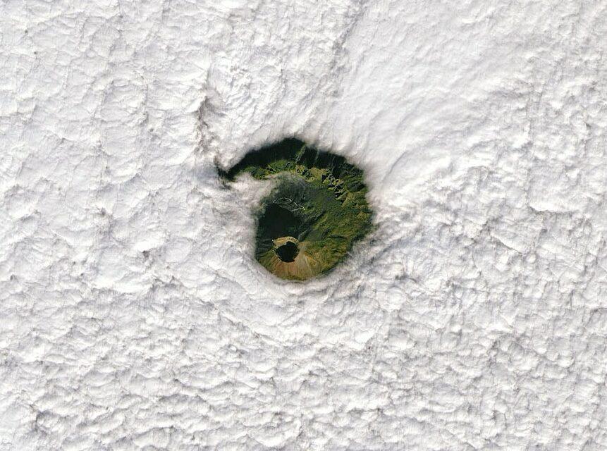 Mount Vesuvius peaks out through the clouds
