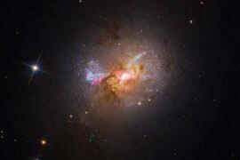 Black hole triggers the birth of new stars in nearby galaxy