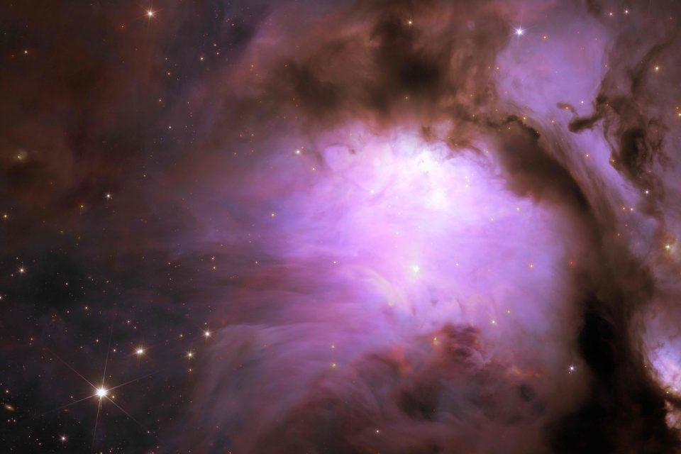 Young stars shine through dense dust
