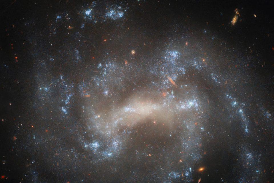 Hubble views a spiral galaxy with stellar explosions