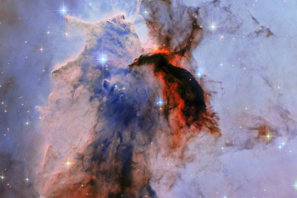 Eagle Nebula: Stars rise in collapsing clouds